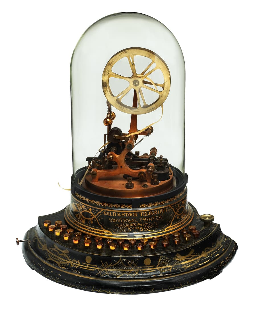 Edison's Universal Stock Ticker, 1870, under its glass dome